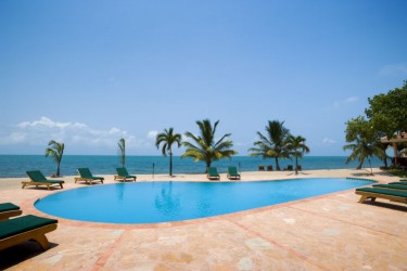 Belizean Dreams, situated on the Caribbean Coast of Southern 
Belize, this superb enclave of 9 luxurious, three bedroom, three bathroom, beachfront private vacation villas is ideal for adventurers who dream of a holidays 
coastal retreat in the heart of a lush tropical haven. If you�re a coastal enthusiast seeking an adventure vacation, Belizean Dreams provides an excellent 
return to nature.