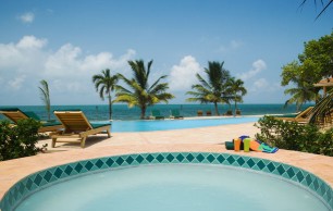 Belizean Dreams, situated on the Caribbean Coast of Southern 
Belize, this superb enclave of 9 luxurious, three bedroom, three bathroom, beachfront private vacation villas is ideal for adventurers who dream of a holidays 
coastal retreat in the heart of a lush tropical haven. If you�re a coastal enthusiast seeking an adventure vacation, Belizean Dreams provides an excellent 
return to nature.