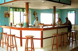 St. George's Caye Pleasure Island Resort, located on an idyllic island steeped in history, off the Caribbean Coast of Belize and only half a mile from the Belize Barrier Reef.  A lovely laid-back place with Colonial style island cottages.
