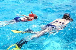 St. George's Caye Pleasure Island Resort, located on an idyllic island steeped in history, off the Caribbean Coast of Belize and only half a mile from the Belize Barrier Reef.  A lovely laid-back place with Colonial style island cottages.