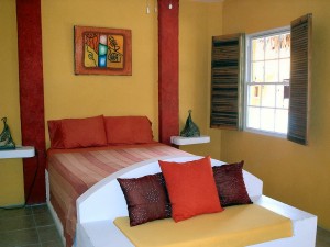 Caye Caulker Belize - Seaside Cabanas - Picturesque thatch-roofed, cabanas 50 feet from the Caribbean in beautiful Caye Caulker, Belize. Cabanas come with private bath, personal refrigerator, coffee maker, phone and cable TV.
